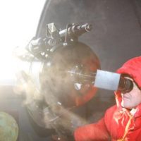 Die Sonne im Küchensieb Sonnenfinsternis 04.01.2011 um 9.18 Uhr