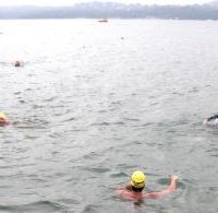 Seeschwimmer im Regen